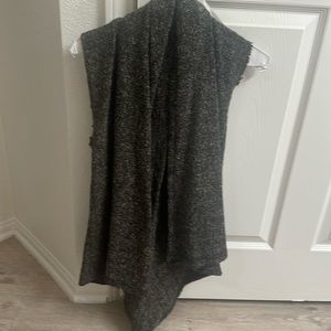 Piko sweater vest. Mint condition shorter in back.